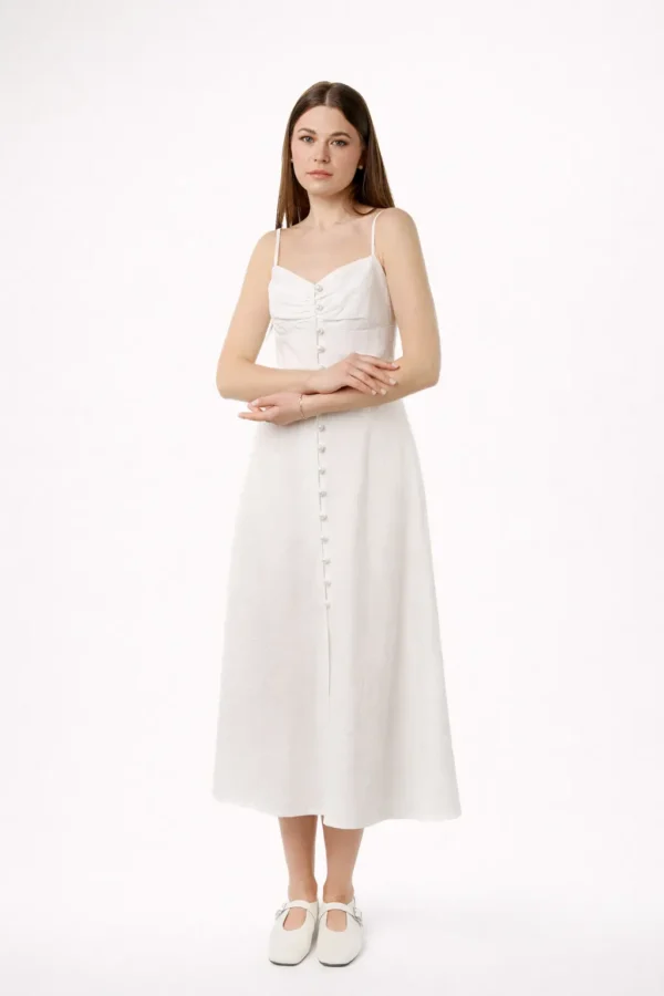 Біла сукня міді April з батисту на бретелях